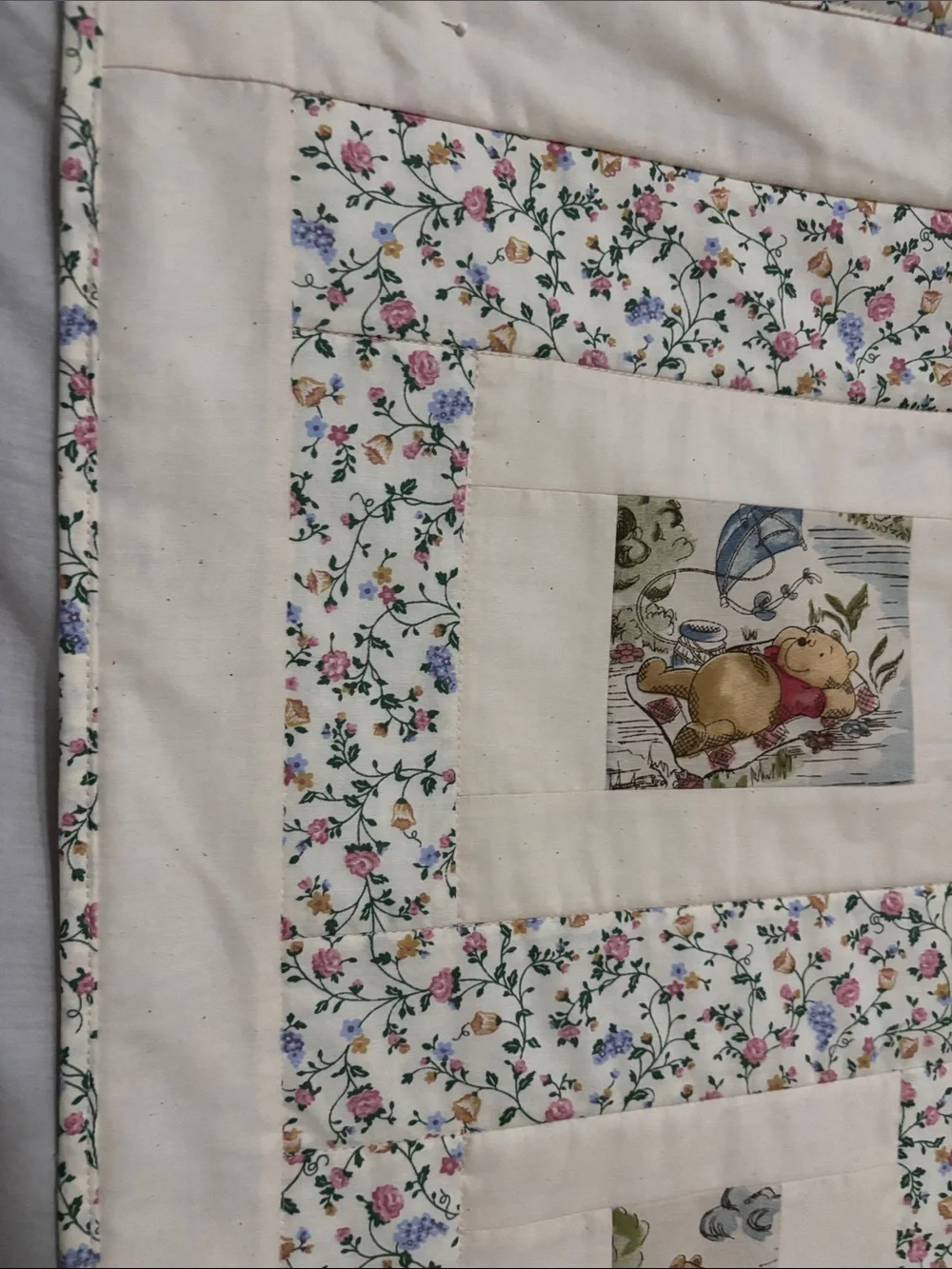 Cream Floral Baby Quilt with Winnie the Pooh characters